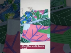 de handdoek van het wafelstrand